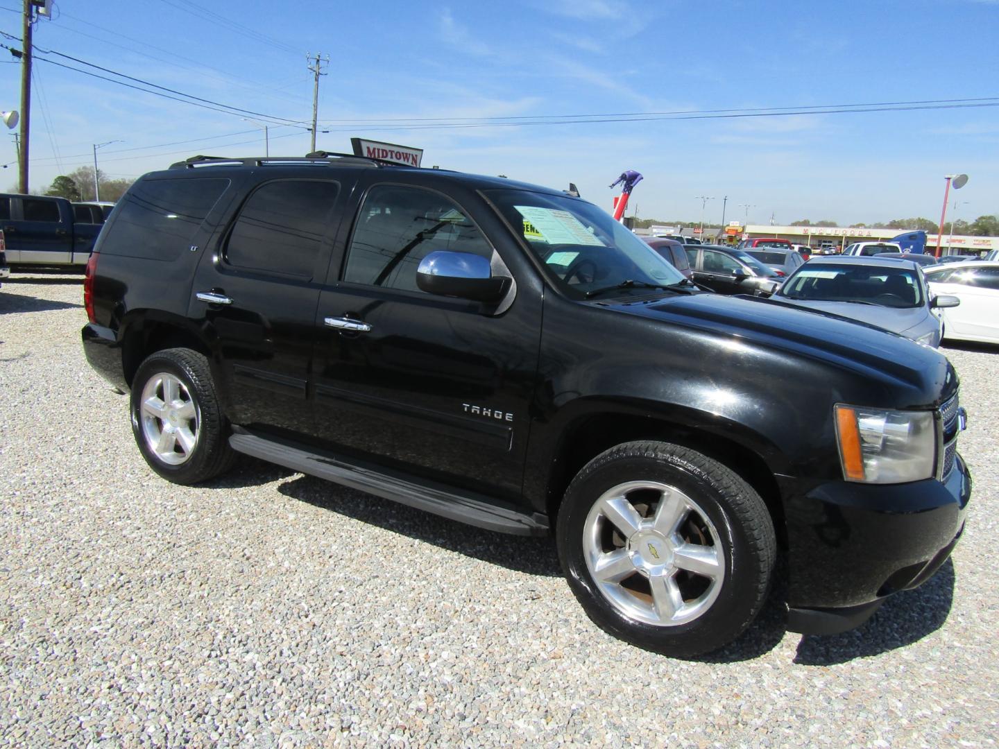 2010 Black Chevrolet Tahoe LT 2WD (1GNUCBE08AR) with an 5.3L V8 OHV 16V FFV engine, Automatic transmission, located at 15016 S Hwy 231, Midland City, AL, 36350, (334) 983-3001, 31.306210, -85.495277 - Photo#0